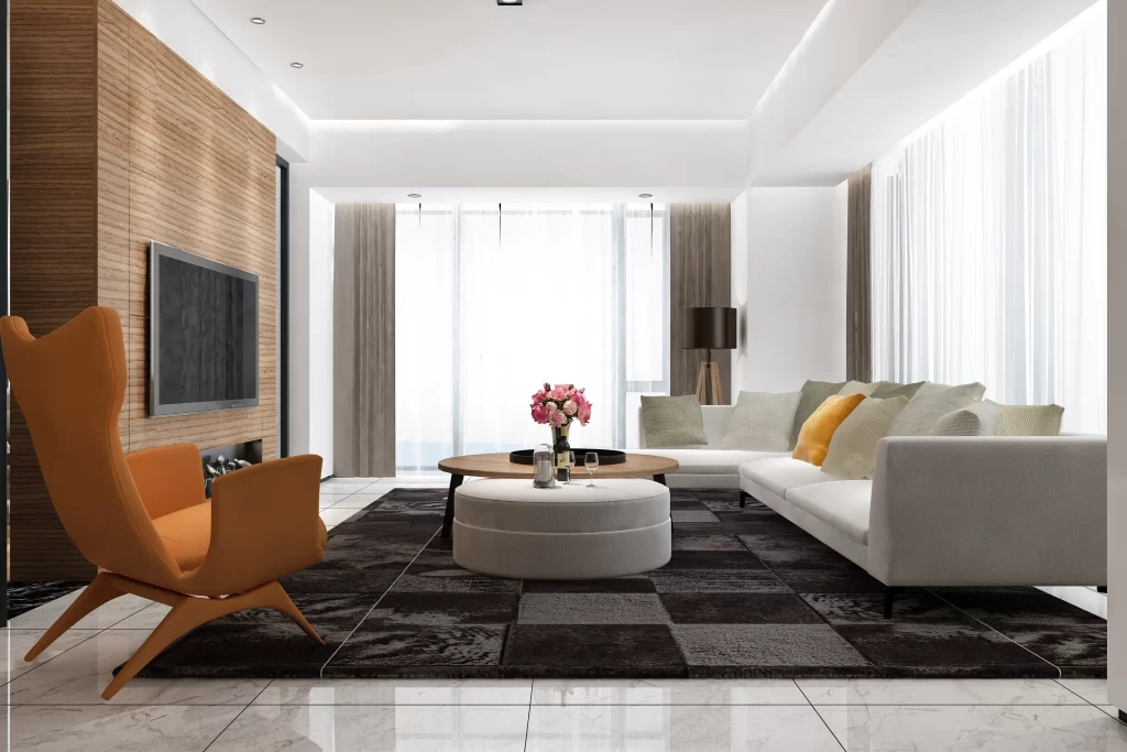 A luxurious and modern living room with natural lighting and elegant furniture, designed by Tanasha Interior for a residence in Eden Wave City.
